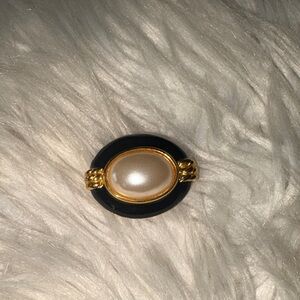 Elegant Gold and Black Brooch